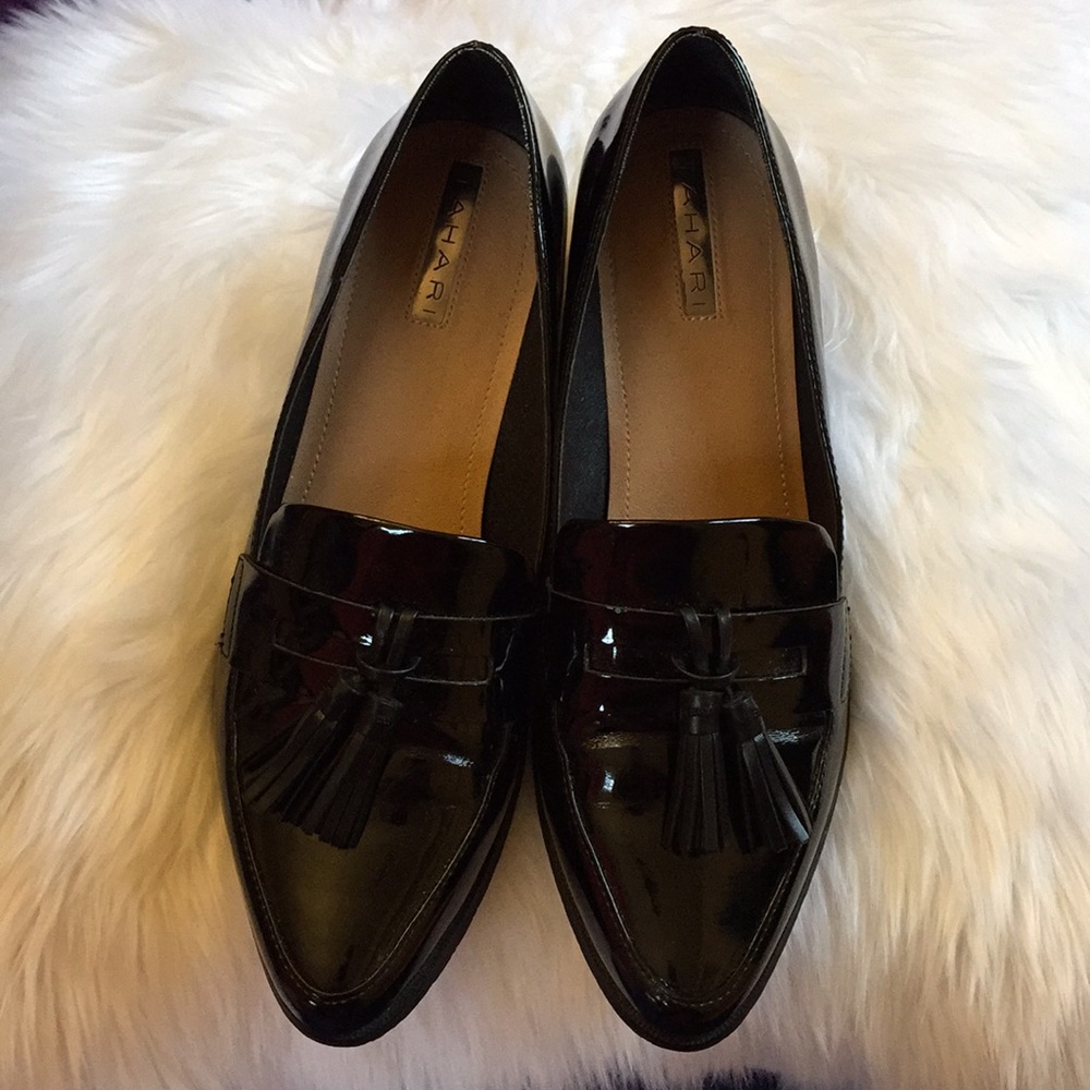 Black patent tassel loafers by Tahari barely worn